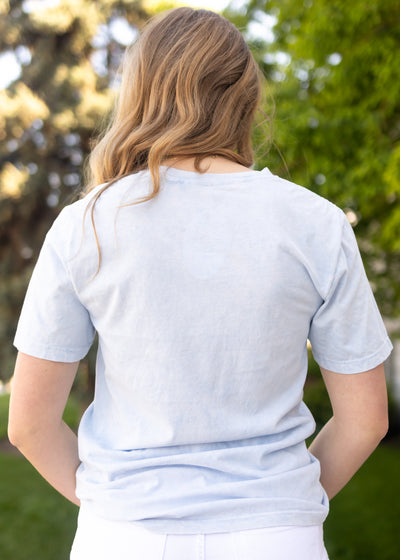 Back view of a short sleeve desert night blue tee