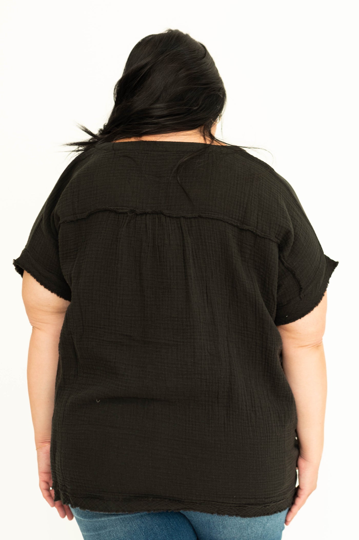 Back view of a plus size gauze top