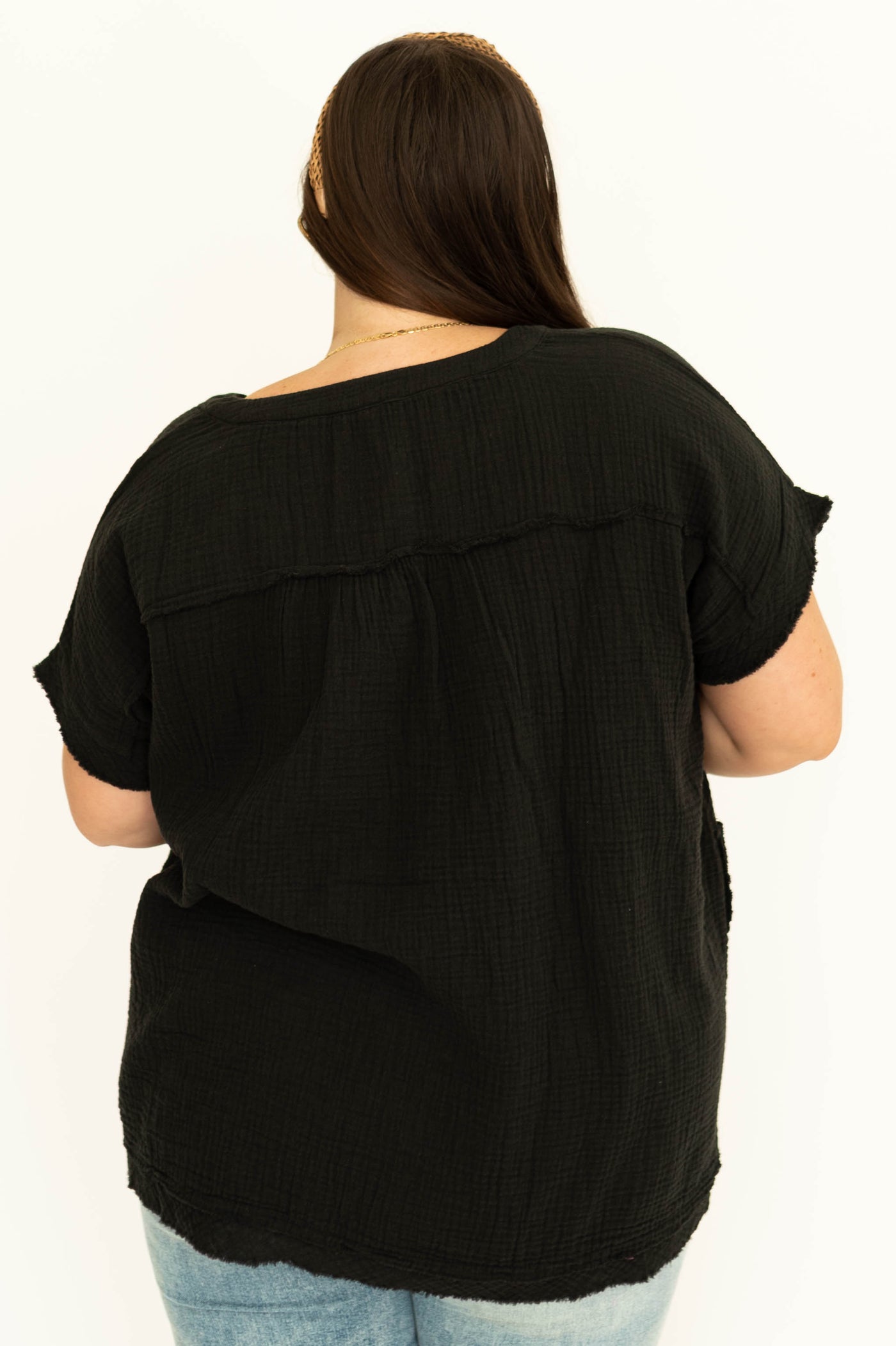 Back view of a black top