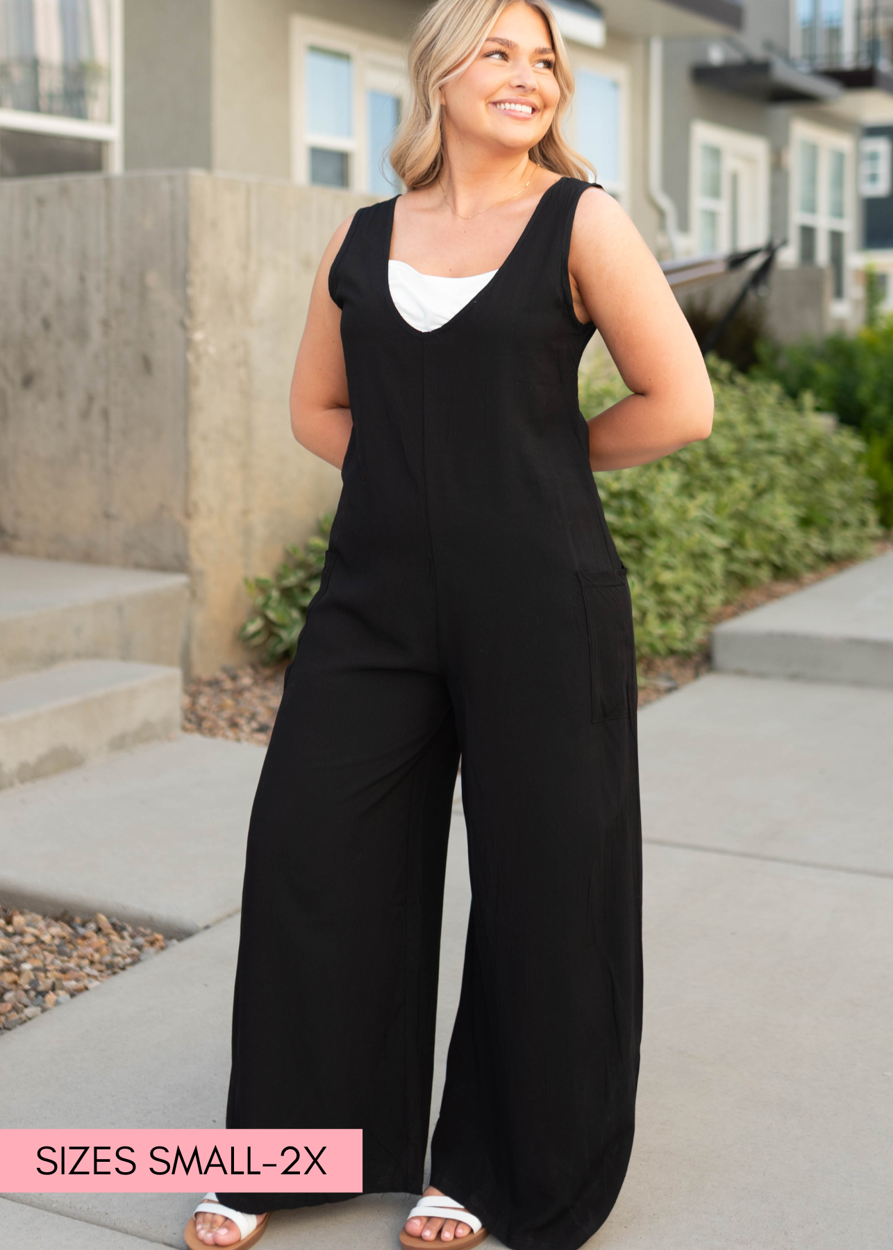 V-neck black jumpsuit with pockets