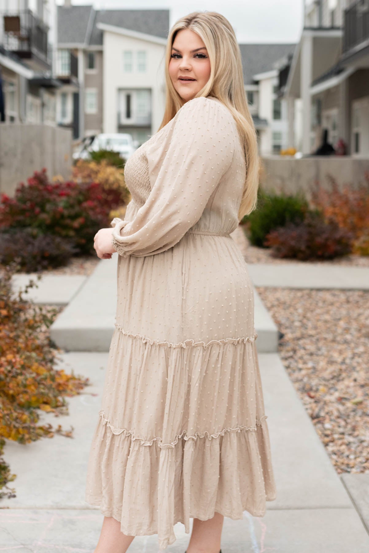 Side view of a plus size stone textured dress
