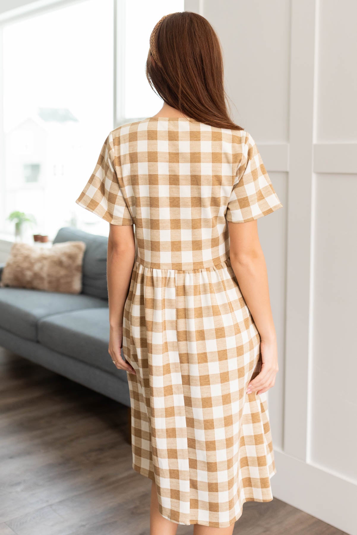 Back view of the camel button down dress