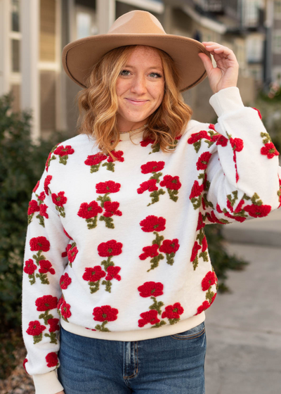 Long sleeve fleece flowered sweater with red flowers