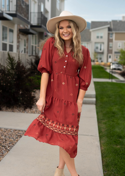 Dark terracotta dress with button up bodice