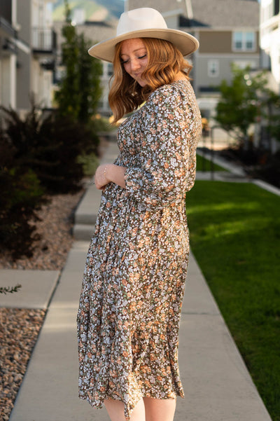 Side view of a chestnut floral dress