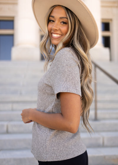 Side view of a heather gray top