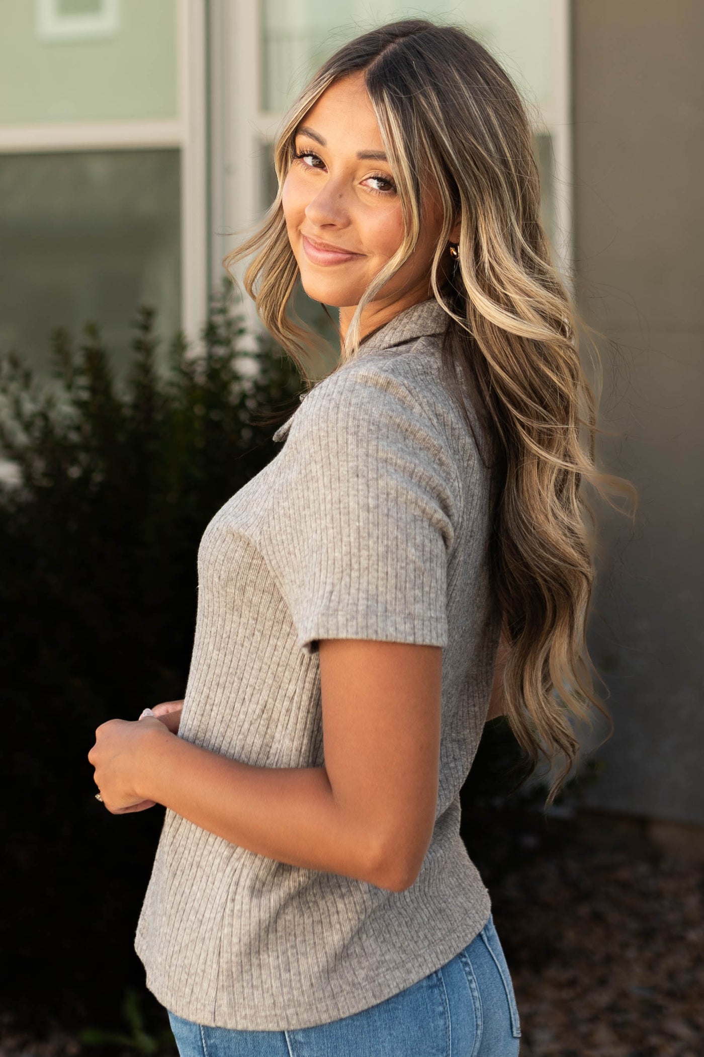 Side view of a heather grey top