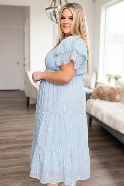 Side view of the plus size light blue lace dress