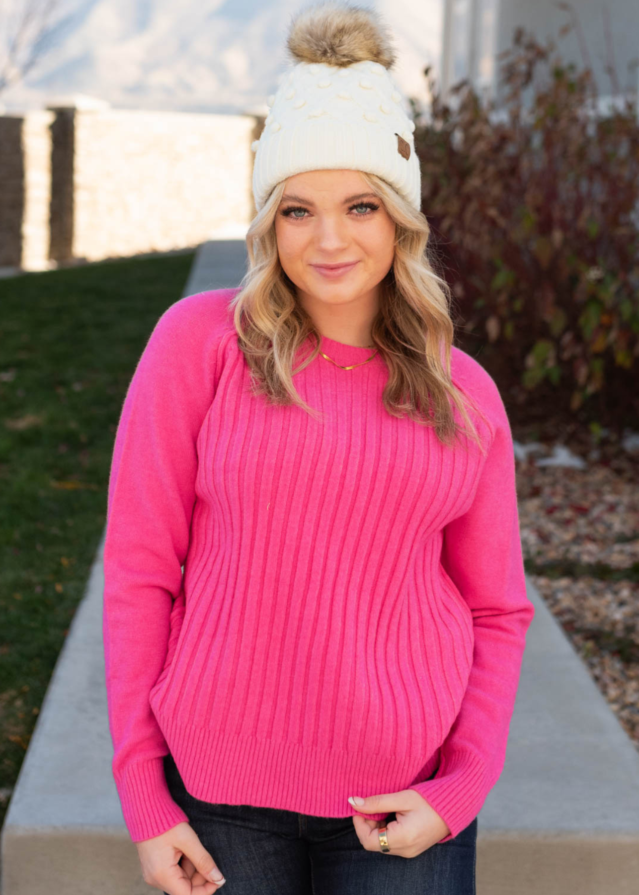 Hot pink sweater with long sleeves