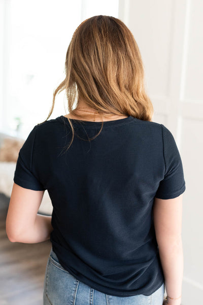 Back view of the navy textured top