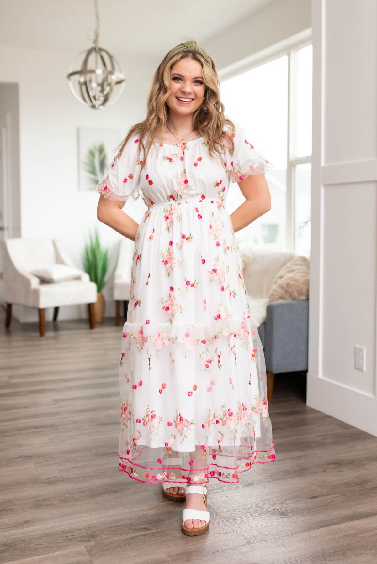 White embroidered floral dress with tiered skirt