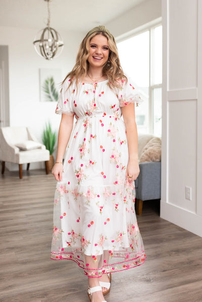White embroidered floral dress with long sleeves