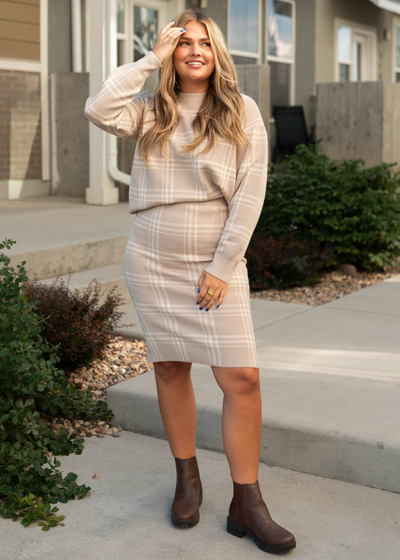 Long sleeve taupe plaid sweater with a taupe plaid skirt that is sold separately