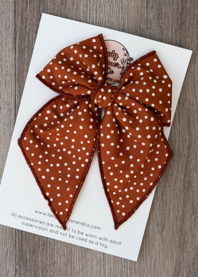 Camel dotted bow