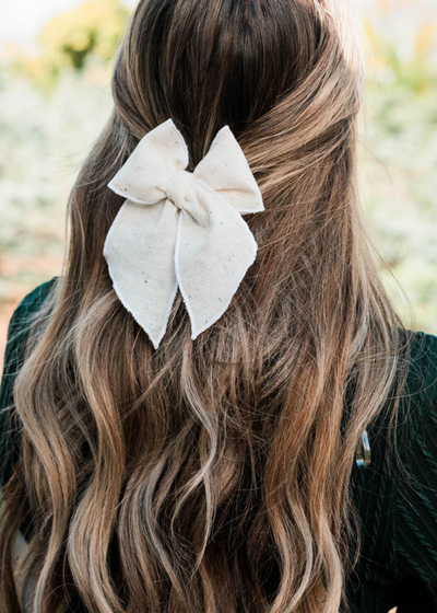 Cream confetti linen bow