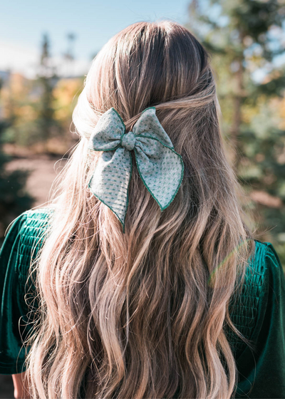 Green textured bow