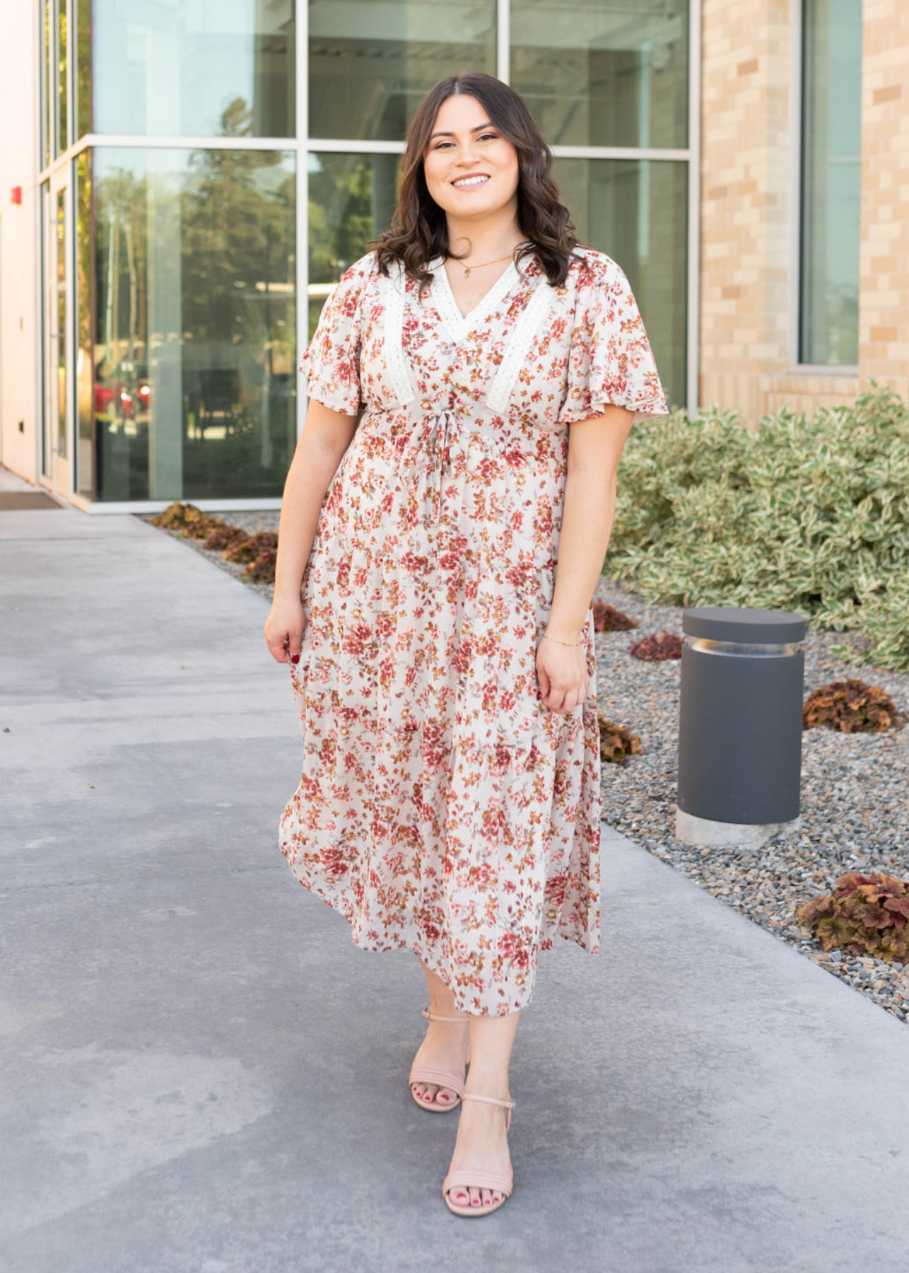 Plus size cream floral tiered dress with short sleeves