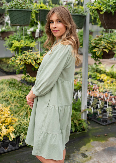 Side view of the the sage button down dress