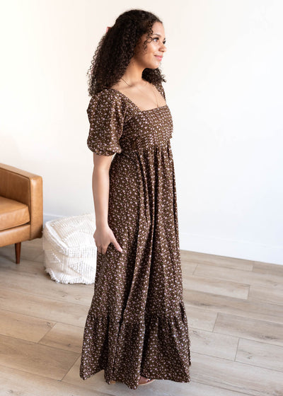 Side view of the brown floral ruffled dress