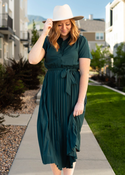Hunter green dress with a pleated skirt