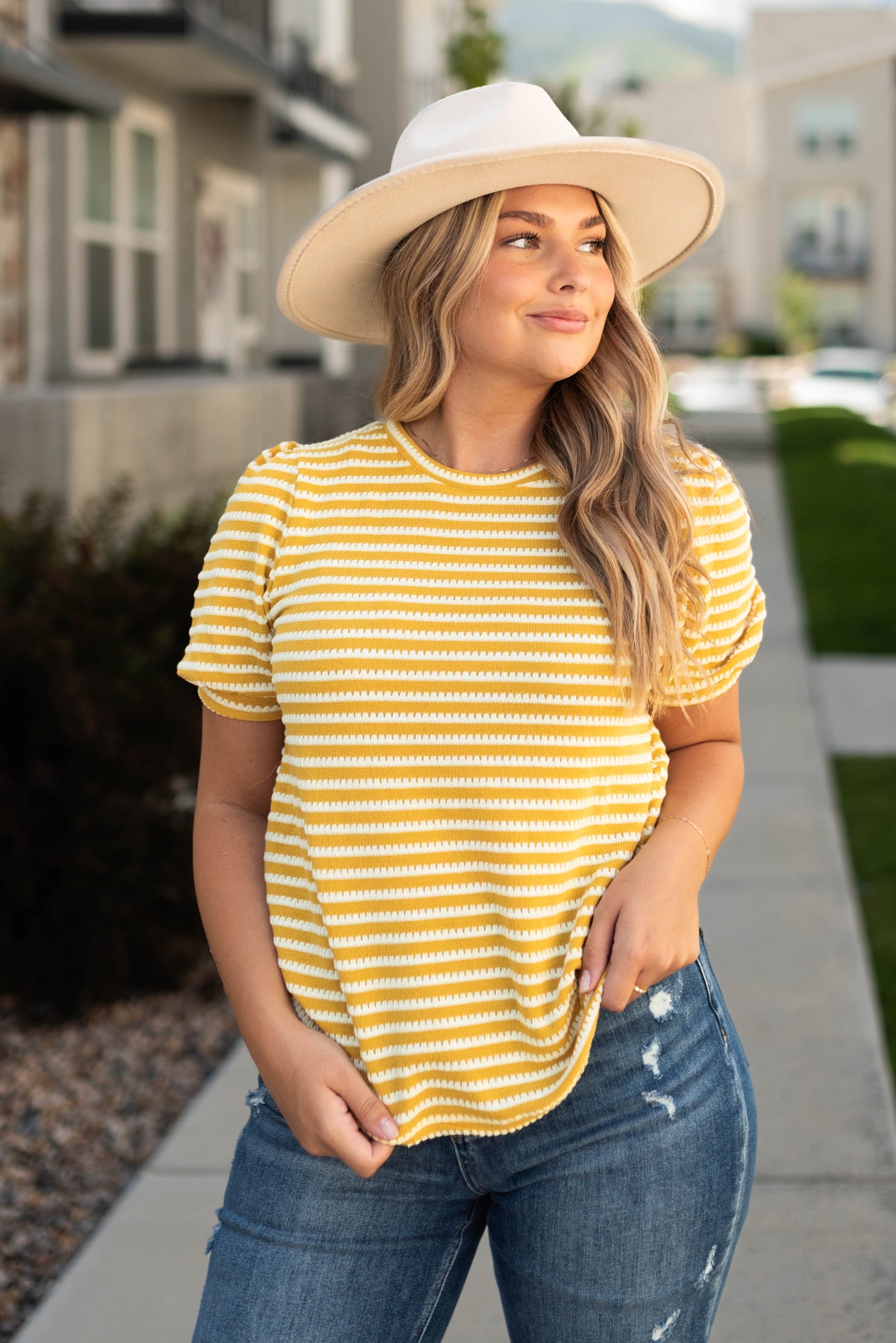Mustard top with short sleeves and white stripes