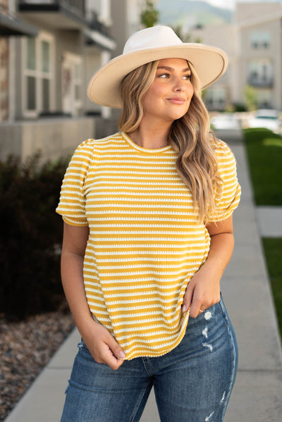 Mustard top with short sleeves and white stripes