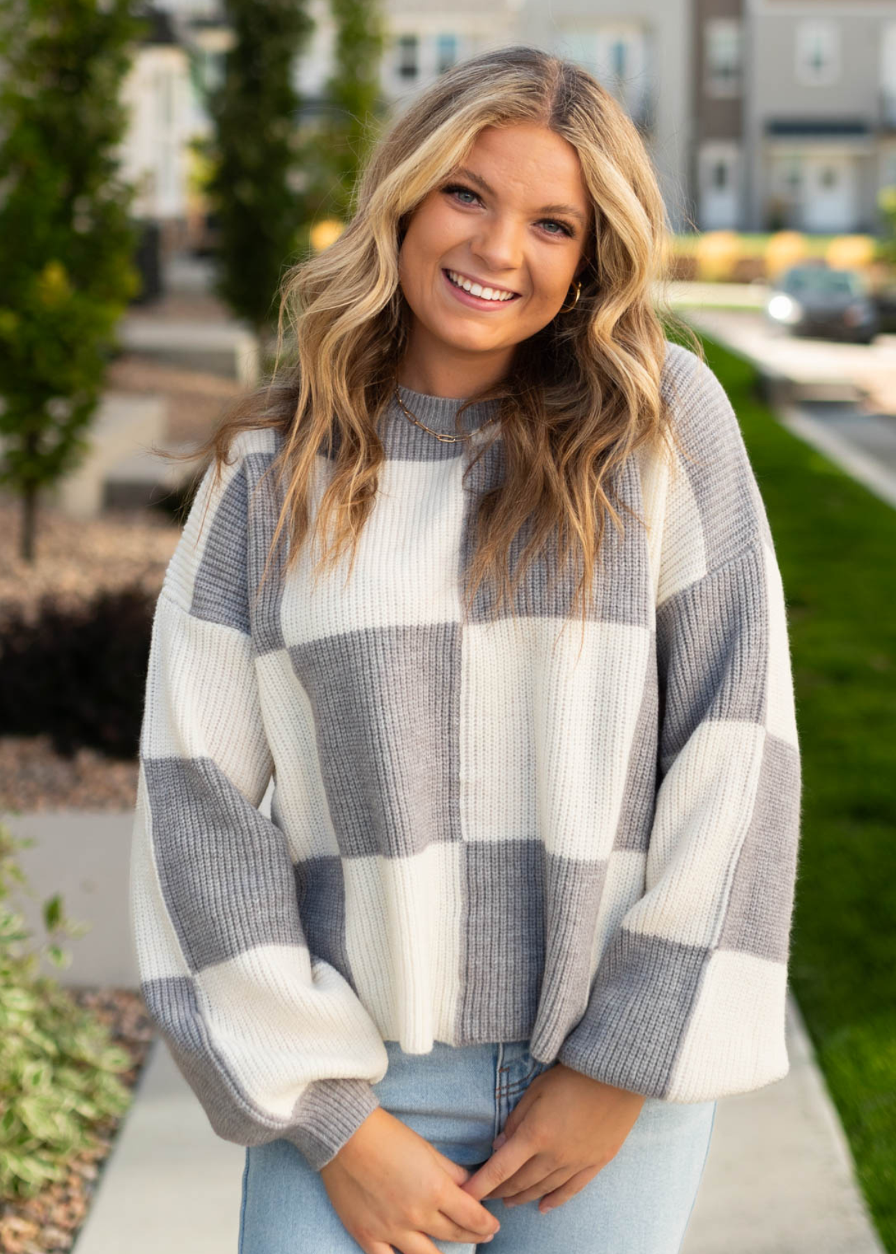 Grey sweater with ivory checkers