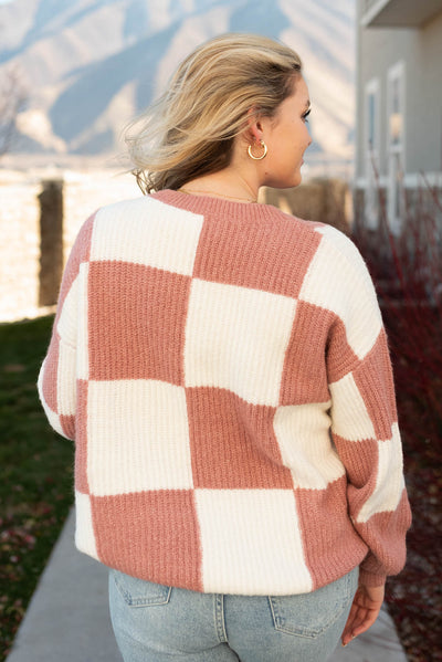 Back view of a marsala sweater