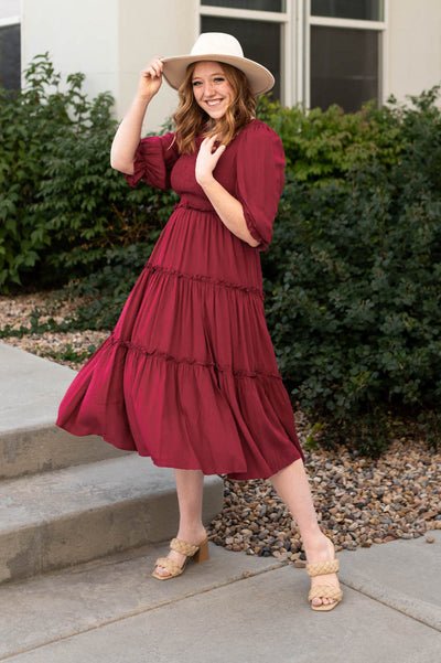 Short sleeve deep red dress with tiered skirt