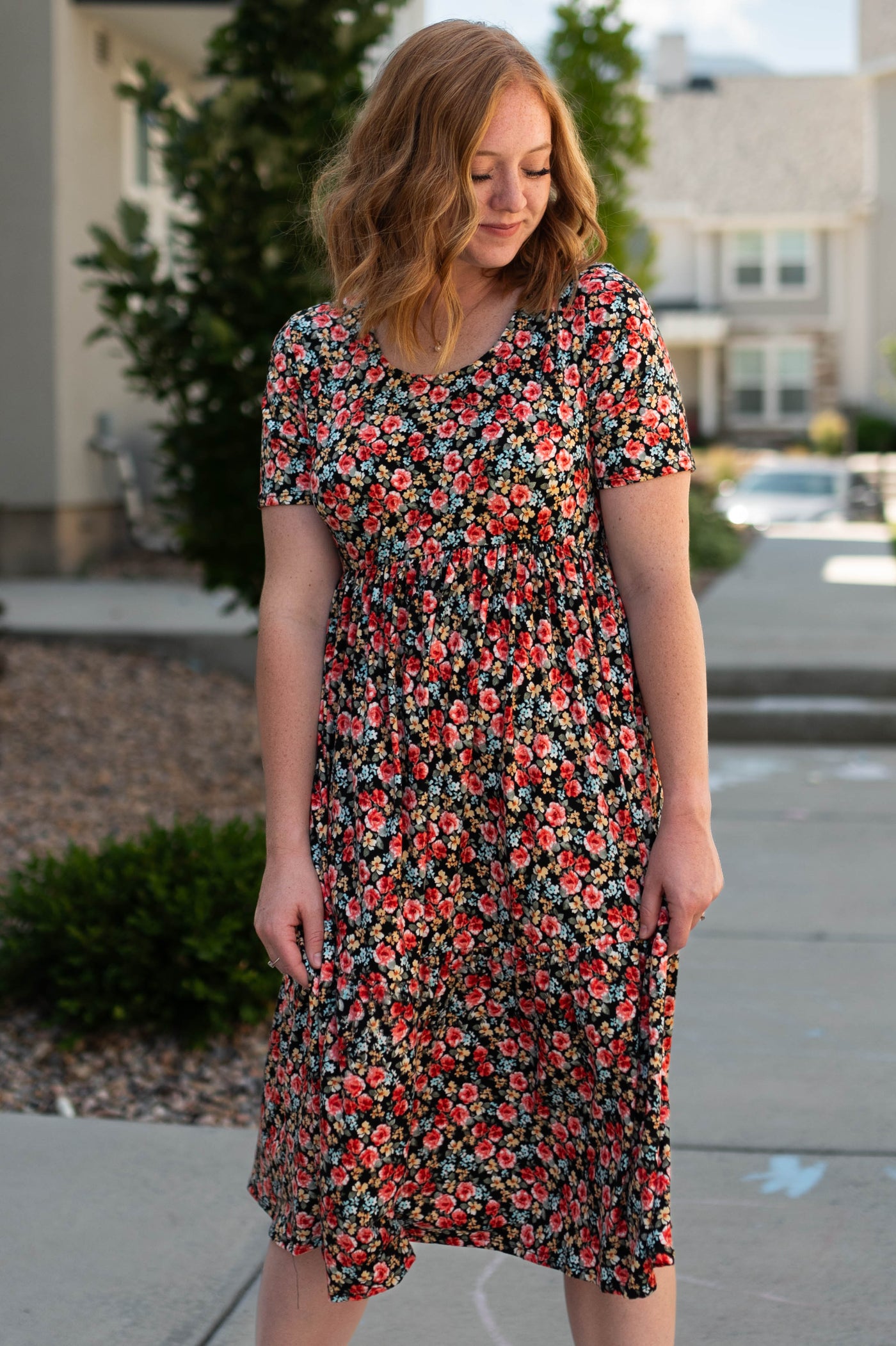 Short sleeve black dress with red flowers