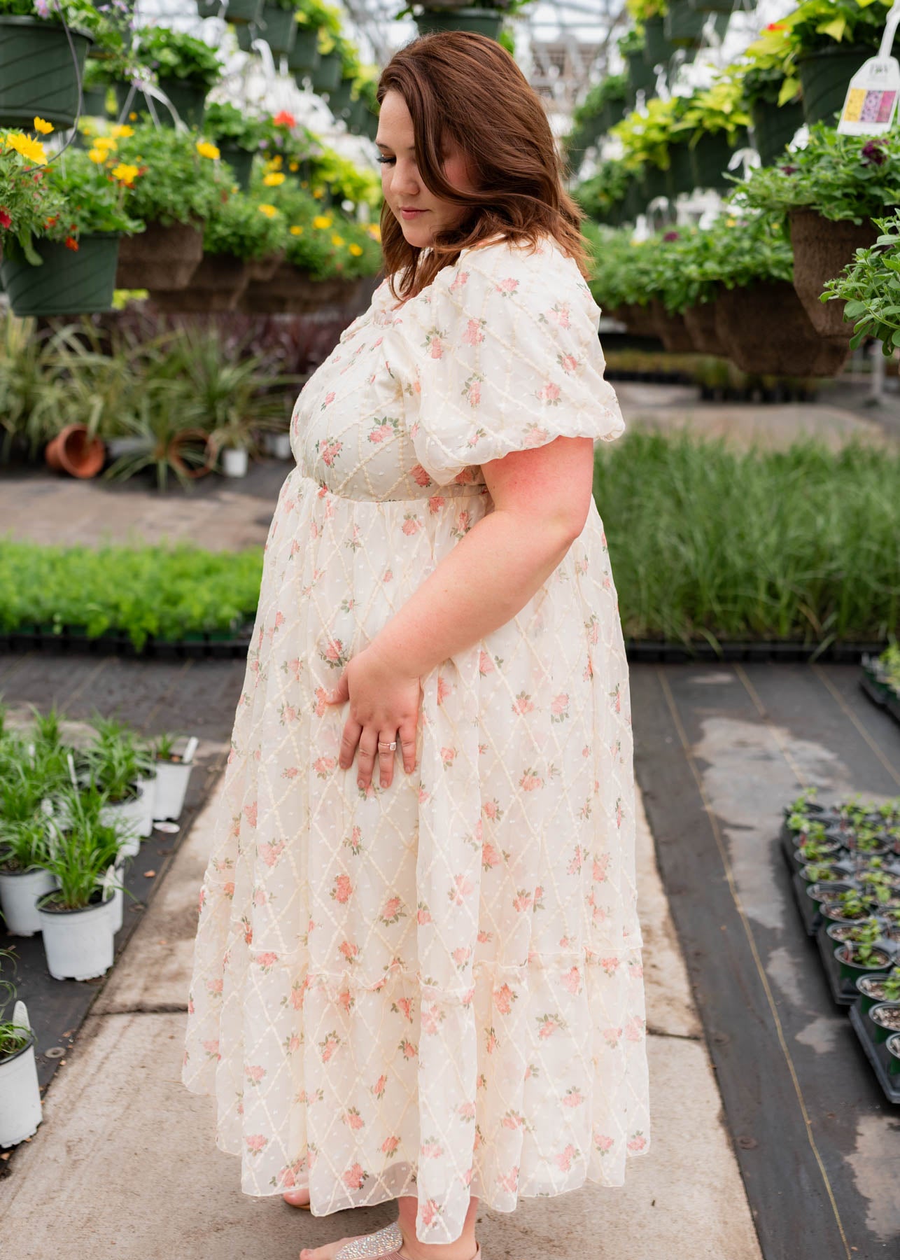 Side view of the cream rose dress in plus size