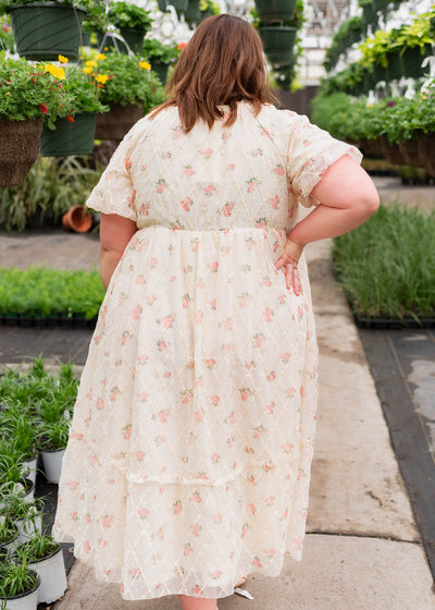 Back view of the plus size cream rose dress