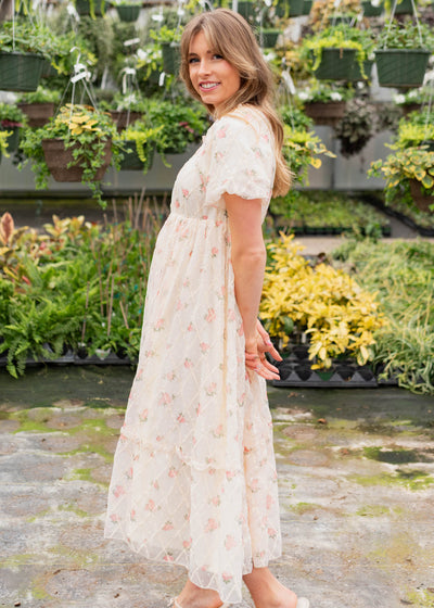 Side view of the cream rose dress