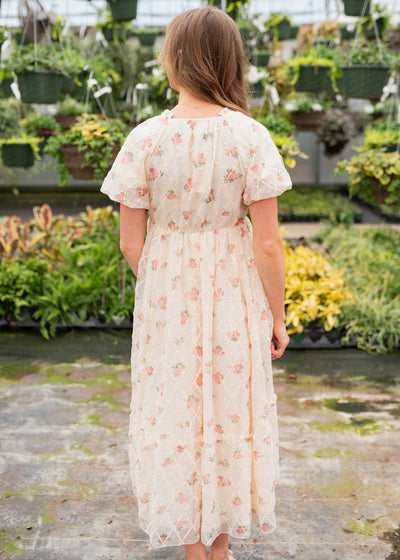 Back view of the cream rose dress