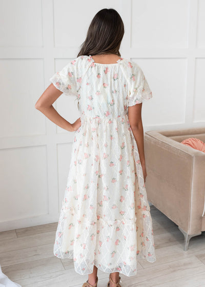 Back view of the cream rose dress