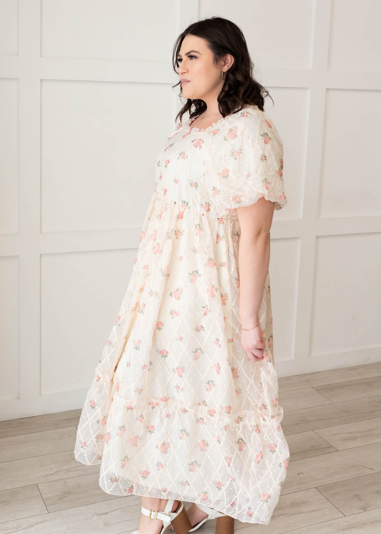 Side view of the plus size cream rose dress