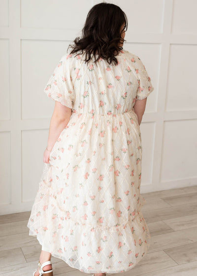 Back view of the plus size cream rose dress