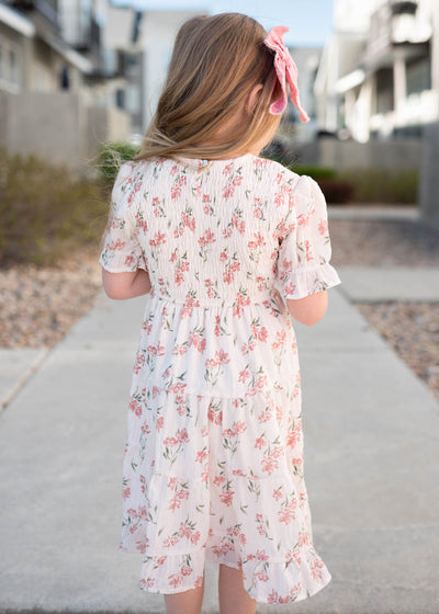 Back view of the pink floral tiered little girl dress