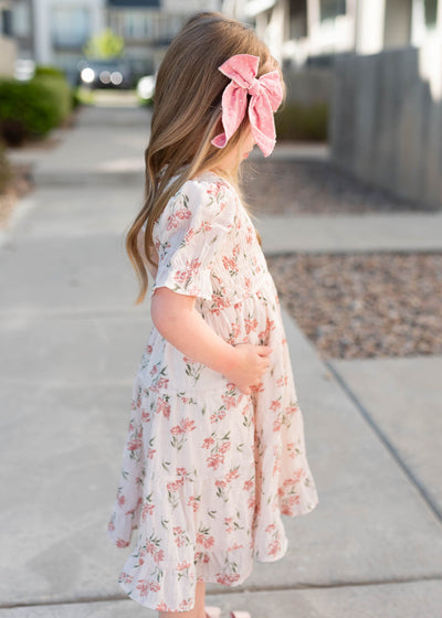 Side view of the pink floral tiered little girl dress
