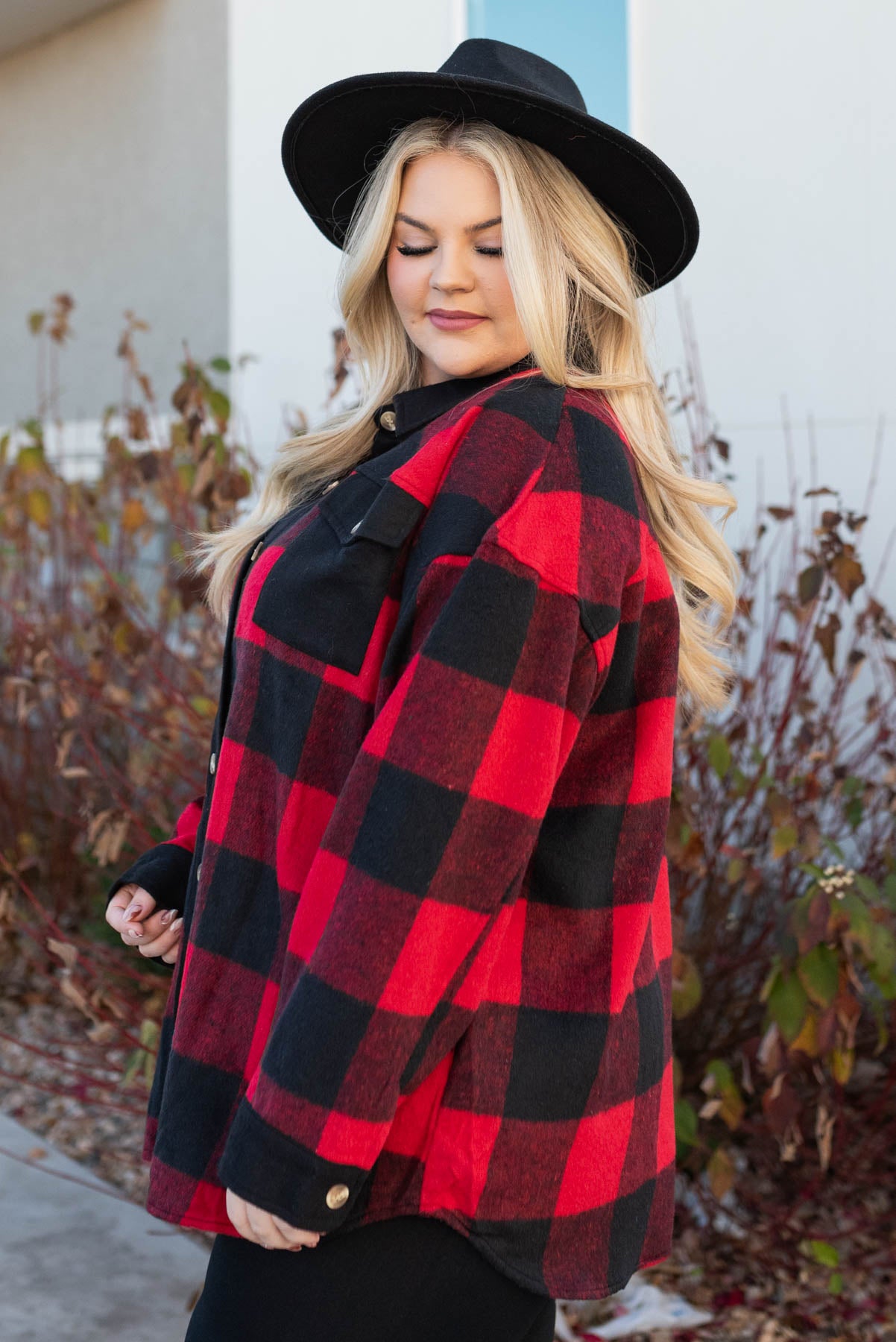 Side view of a plus size buffalo check top