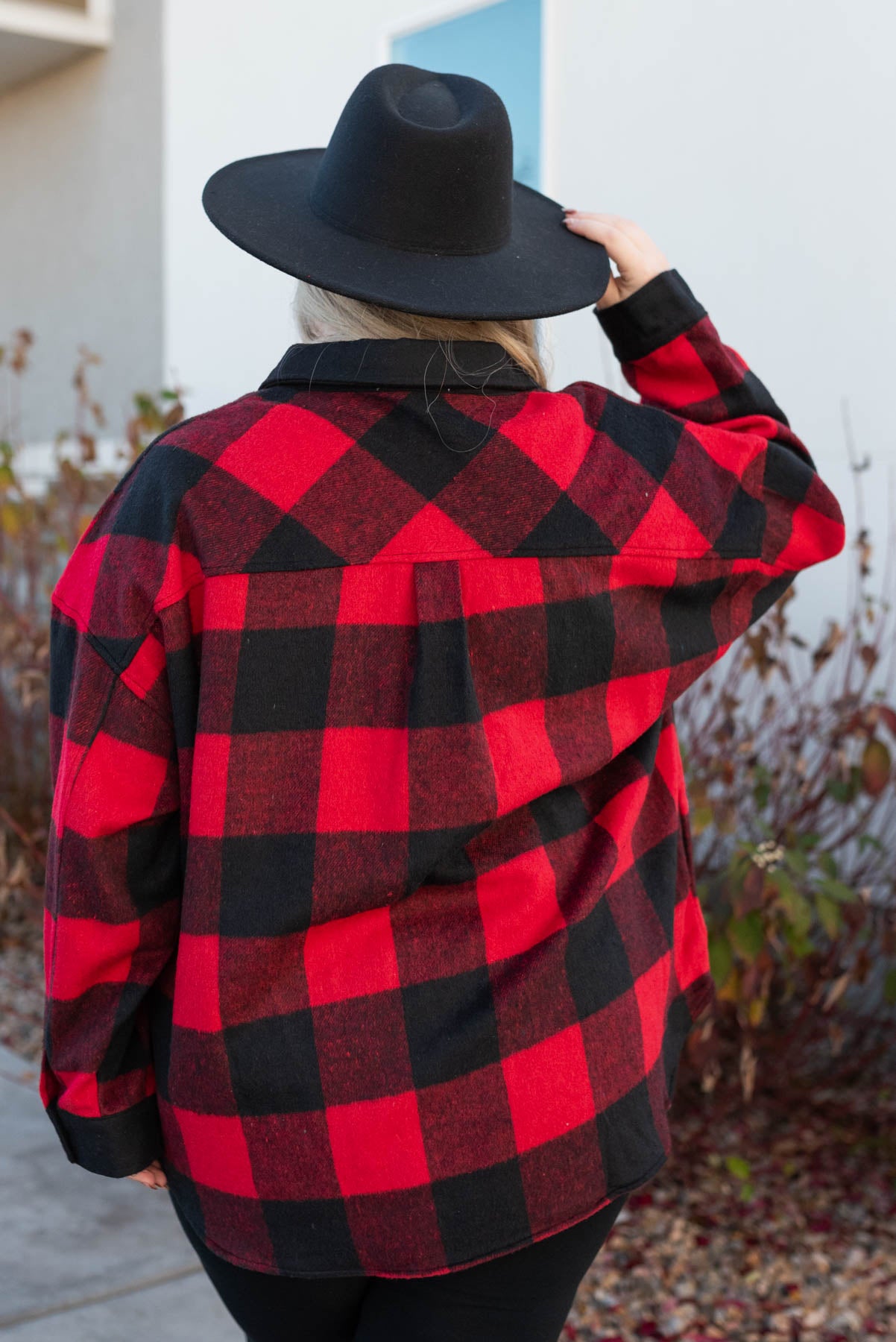 Back view of a plus size buffalo check top