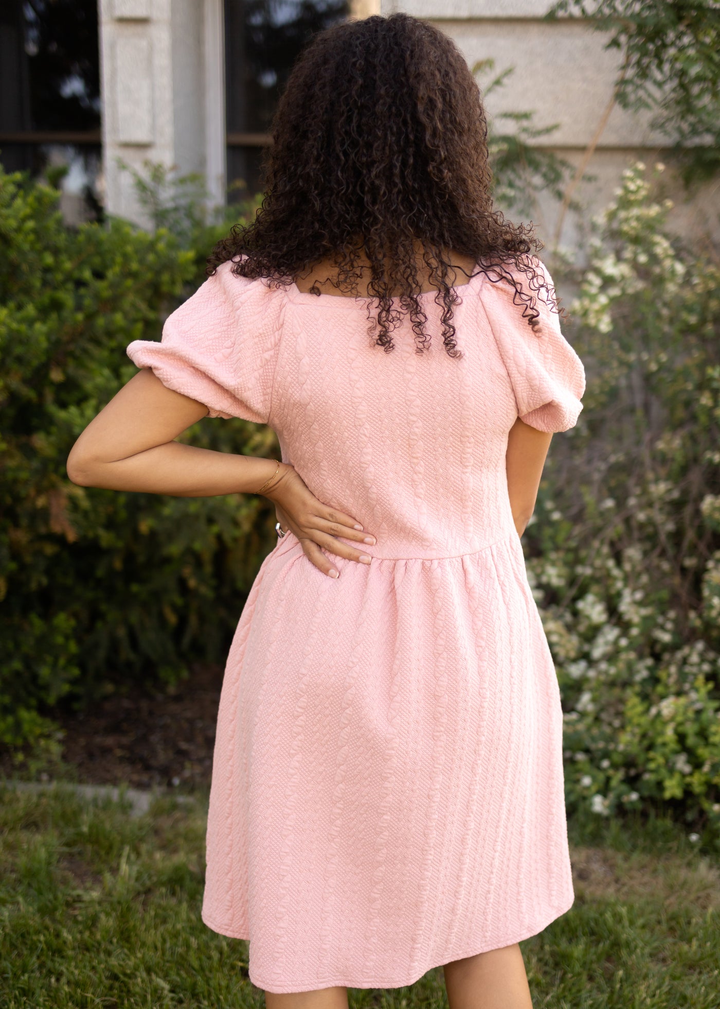 Back view of a dusty pink dress