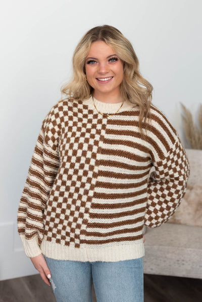 Brown checkered sweater with stripes