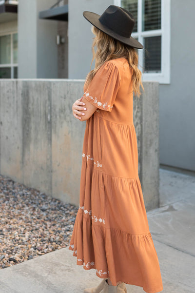 Side view of a caramel dress