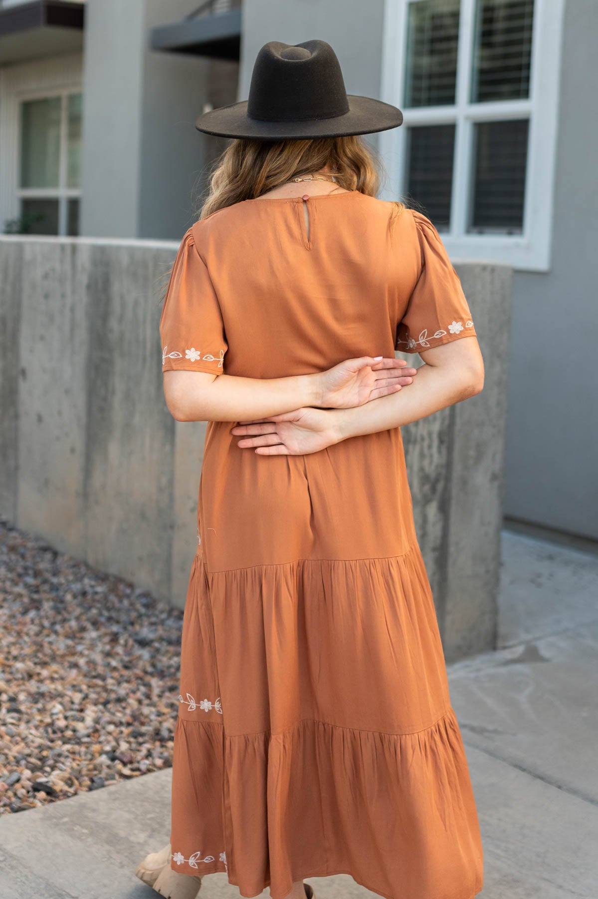 Back view of a caramel dress