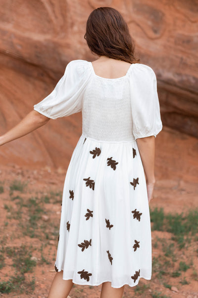 Back view of a ivory dress