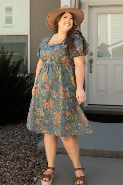 Plus size teal floral dress with pockets and square neck