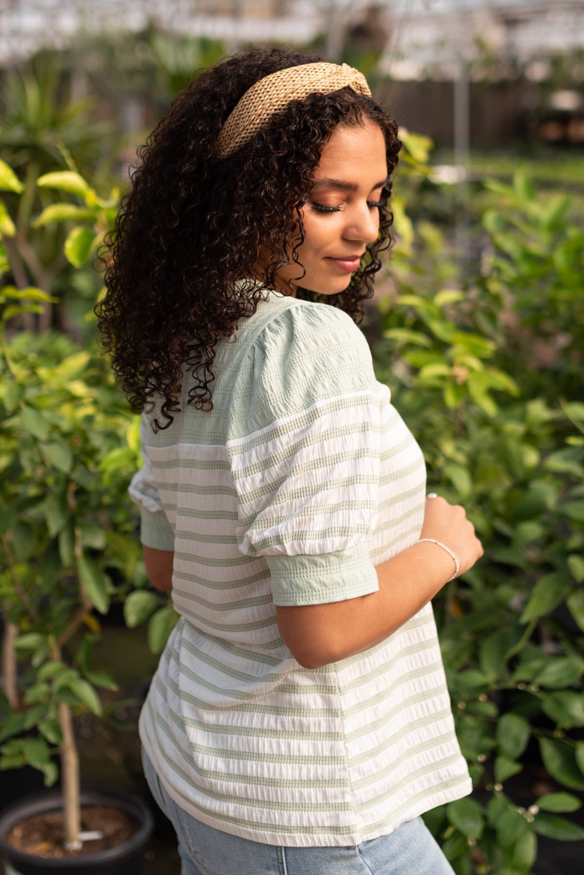 Side view of the sage stripe top