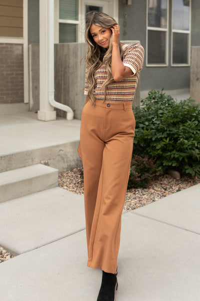 Caramel pants with a olive knit top that is sold separately