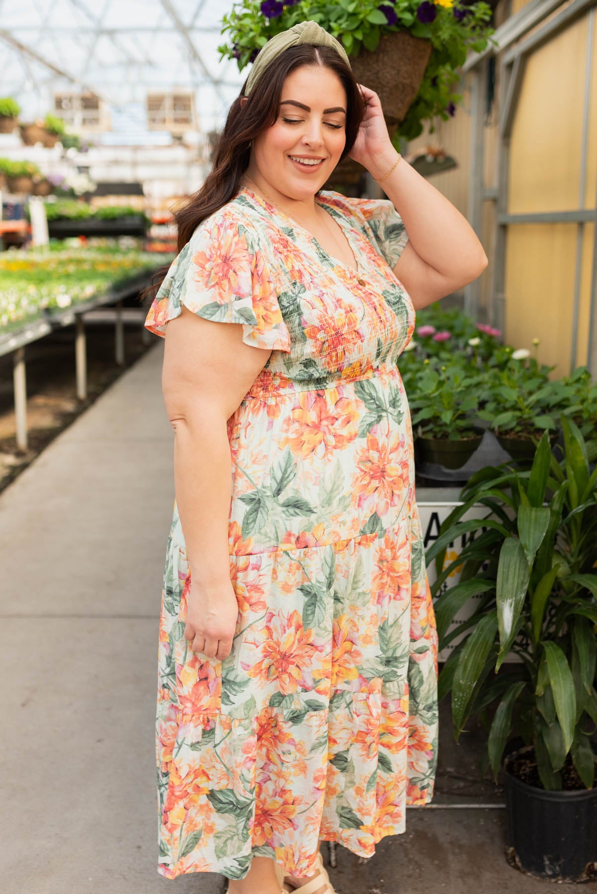 Side view of the plus size mint floral dress